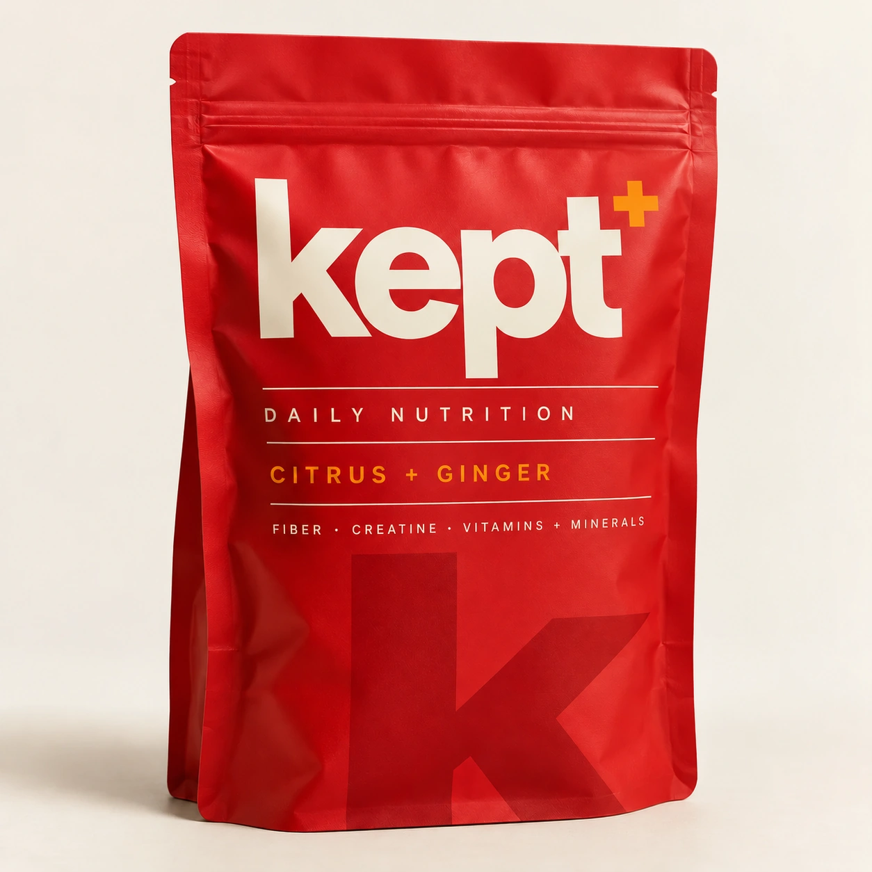 kept+ scarlet pouch with cream lettering and orange accent